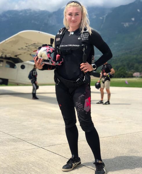 Olga posed by plane