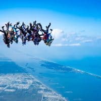 Skydivers flying head down photo edited by Elliot Byrd on Sharing Perspectives Icarus Canopies blog