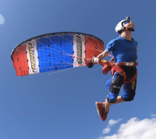 Goncalo Resende landing the Petra canopy at the end of his swoop