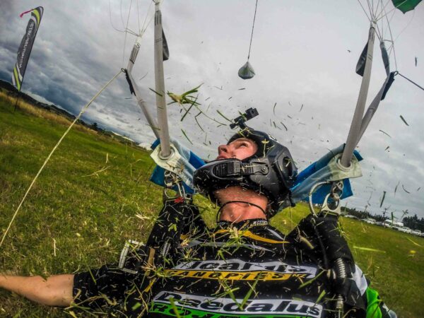 test jumper chris brook landing parachute on grass area