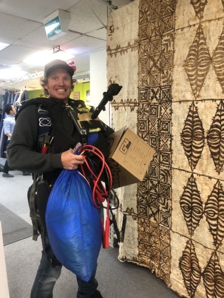 test jumper chris snell carrying skydive gear at NZA factory
