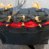double stow locking stows with rubber bands on d-bag