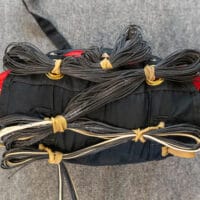 showing excessively large line stows on d-bag