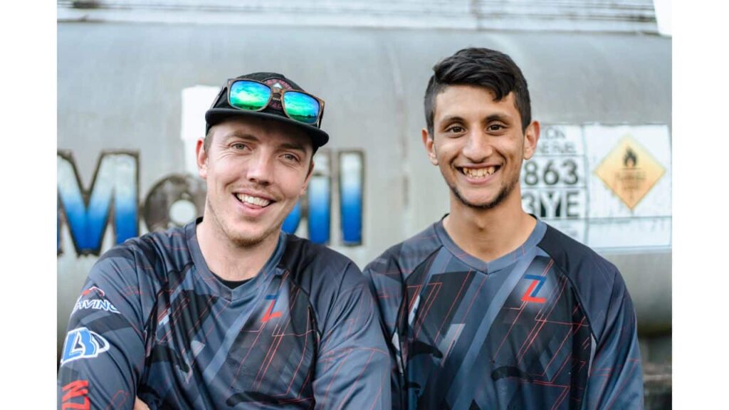 niall & zack standing side by side smiling at camera wearing zcc jerseys