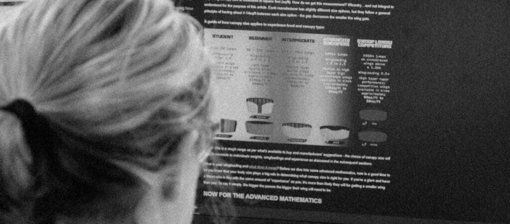 customer looking at parachute buyer's guide on laptop