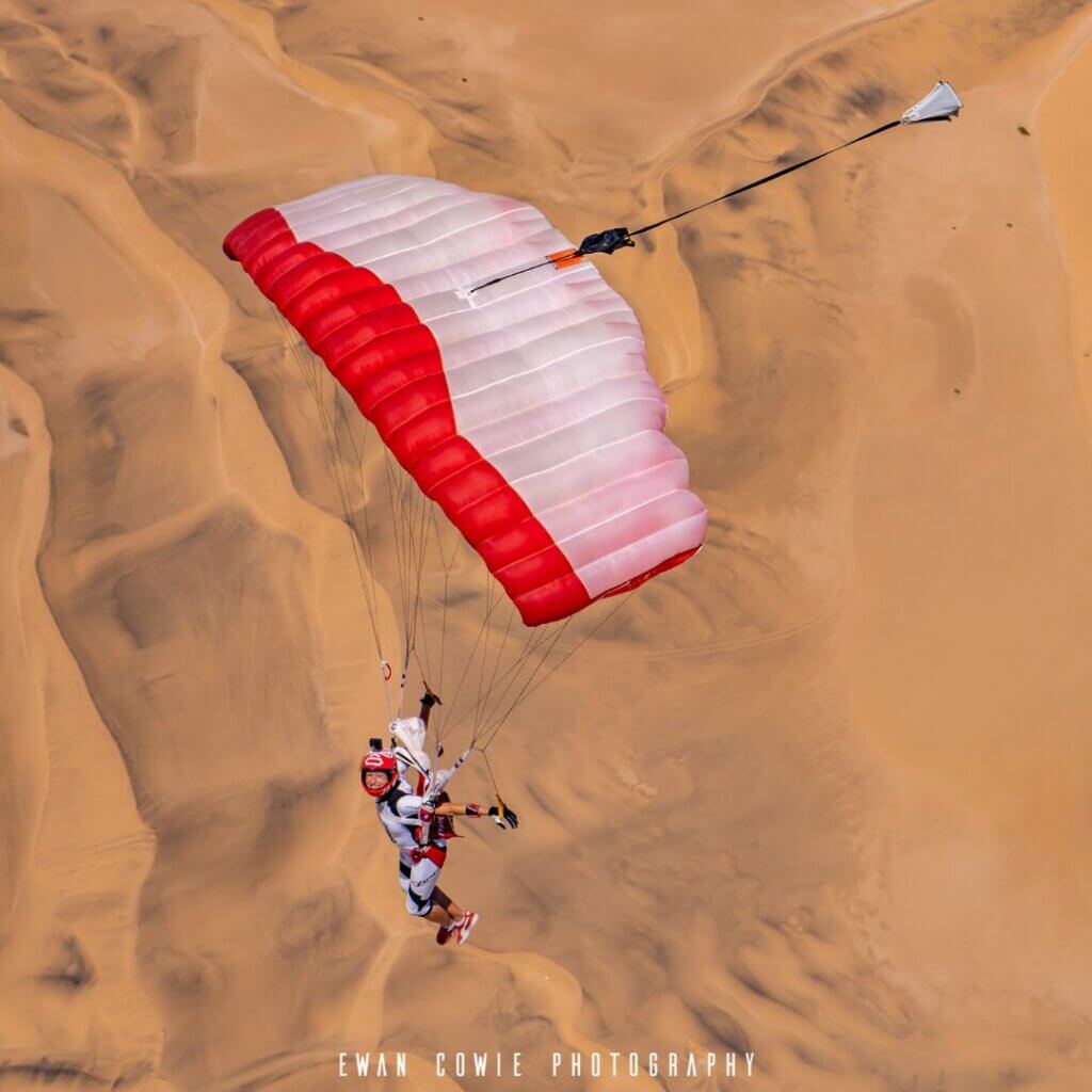 jfx 2 in deep brakes flying over sand dunes