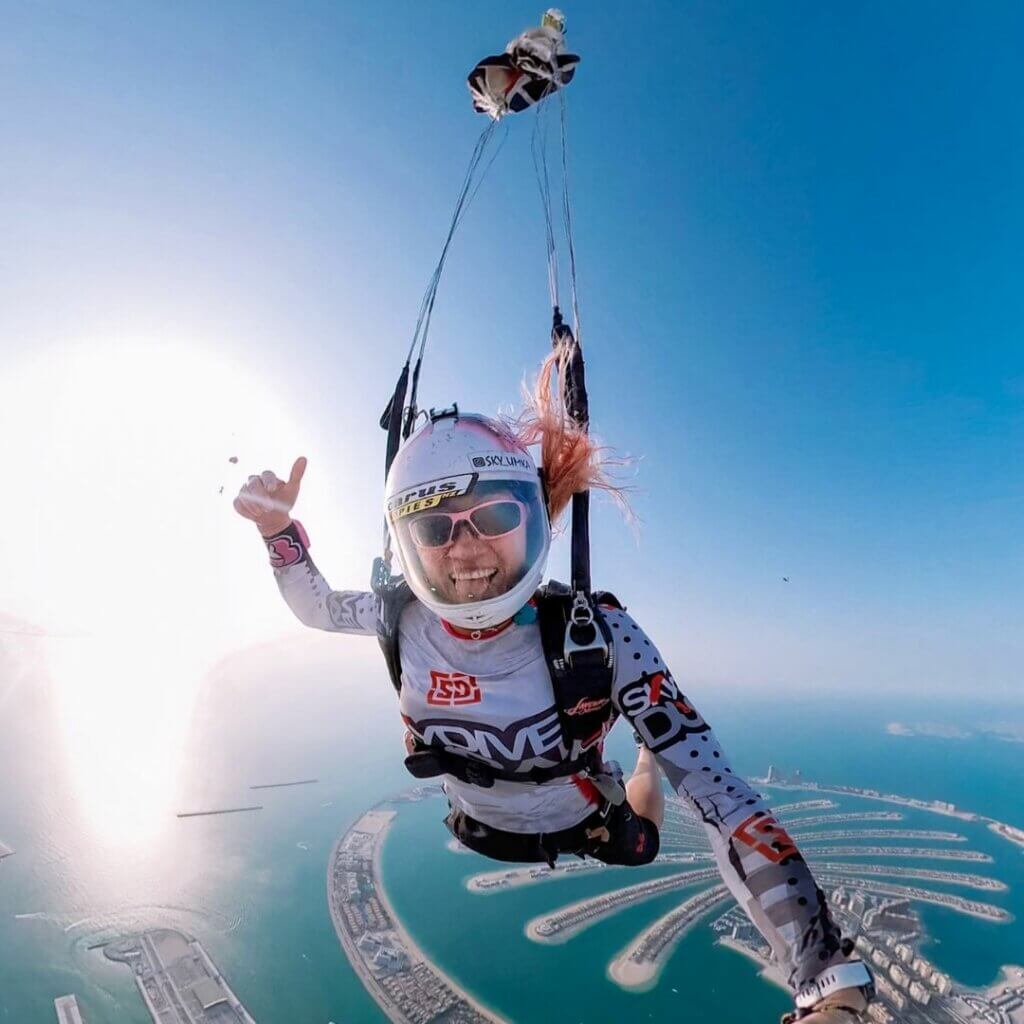 olga under opening high performance canopy flying over palm dubai