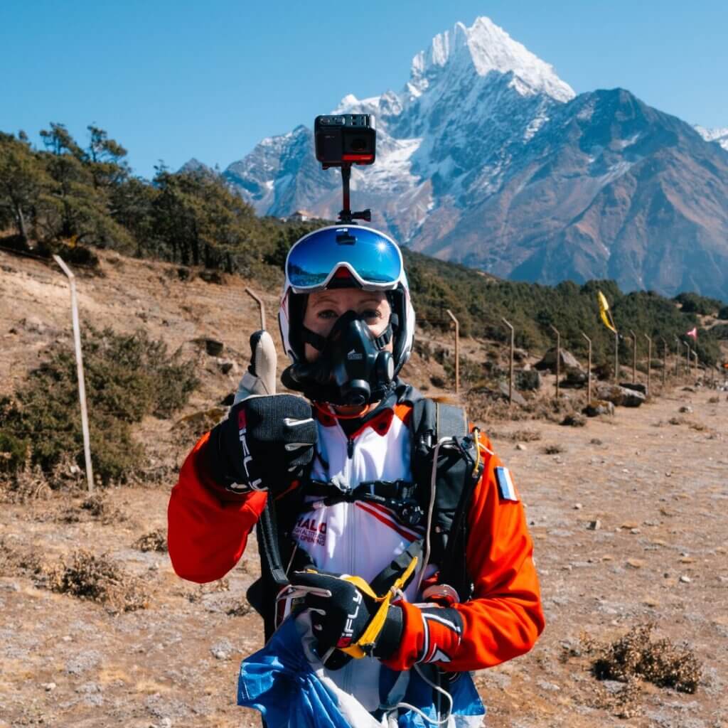 karine giving thumbs up after landing from the everest skydive