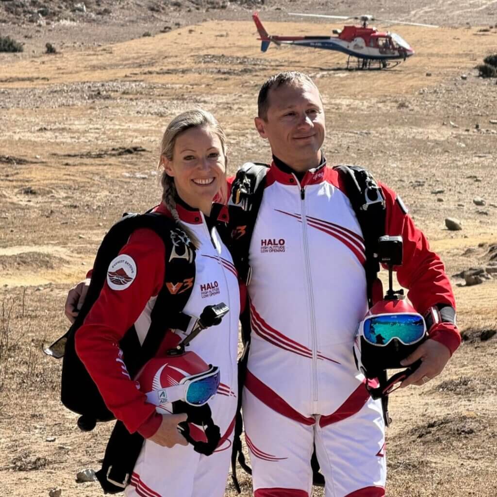 greg and karine geared up in front of everest
