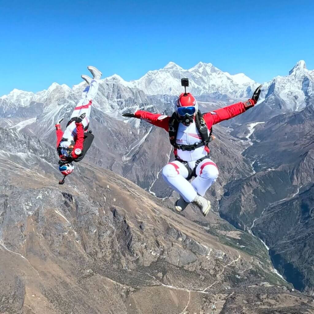 greg cross legged flying in freefall in front of everest