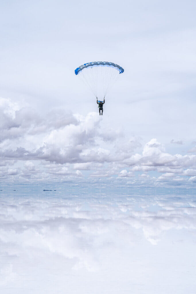 Skydiving over the mirror-like Salt Flats